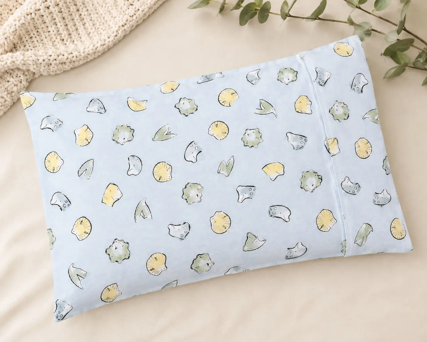 Blue dinosaur baby pillowcase