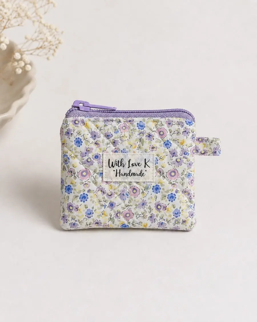 Lavender floral coin purse studio photo